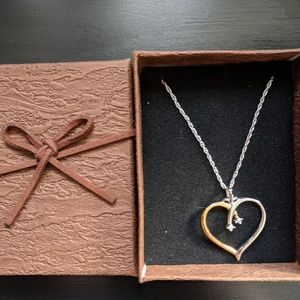 Silver and gold necklace. Two real diamonds